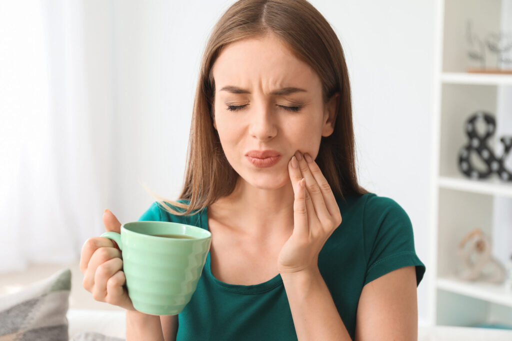 woman with tooth pain